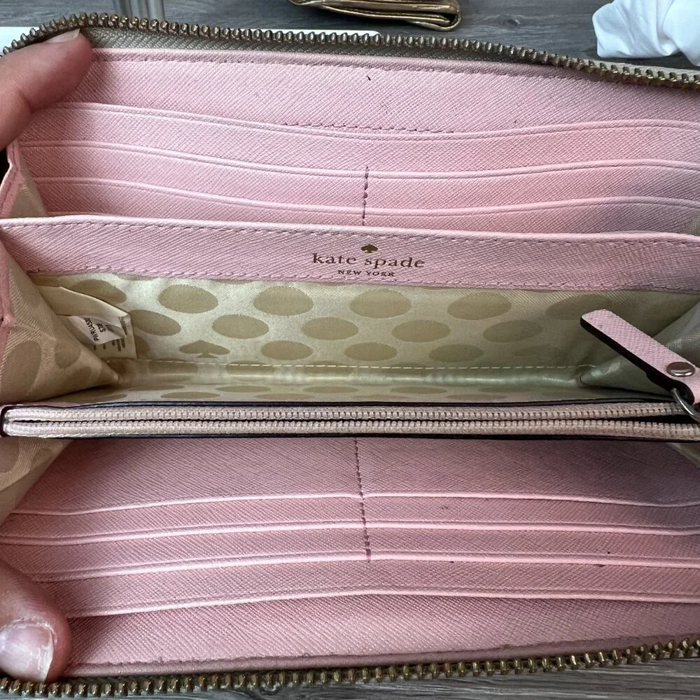 Kate sapde Accordion zip around wallet clutch